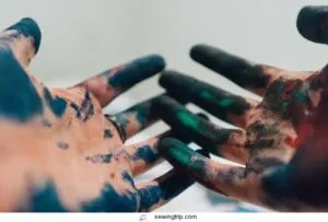 paint-fabric-hands-finger-painting