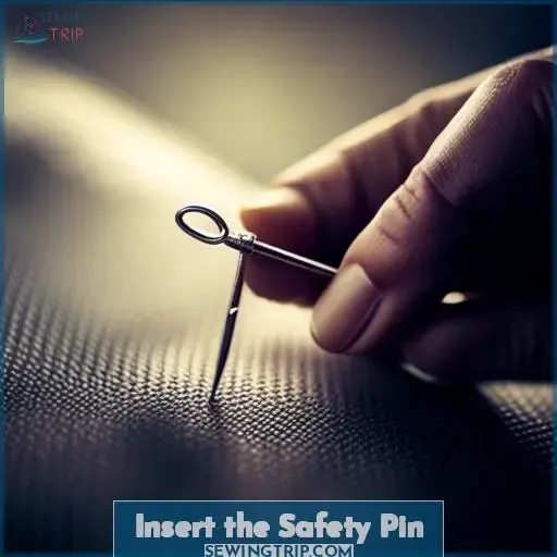 Insert the Safety Pin