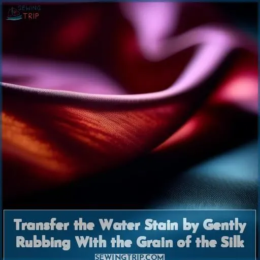 Transfer the Water Stain by Gently Rubbing With the Grain of the Silk