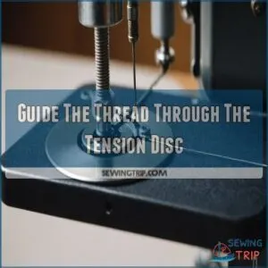 Guide The Thread Through The Tension Disc