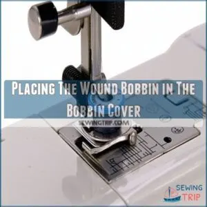 Placing The Wound Bobbin in The Bobbin Cover