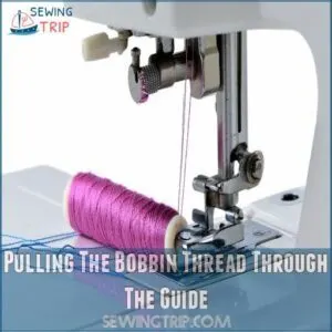 Pulling The Bobbin Thread Through The Guide