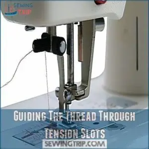 Guiding The Thread Through Tension Slots