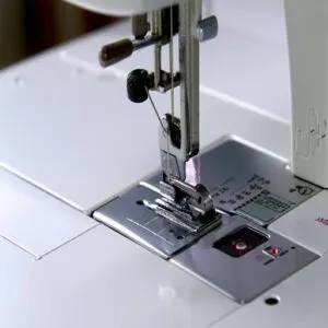 Insert New Needle With Flat Side Facing Back