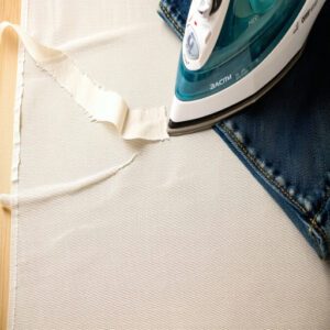 Place a Pressing Cloth Over The Taped Hem