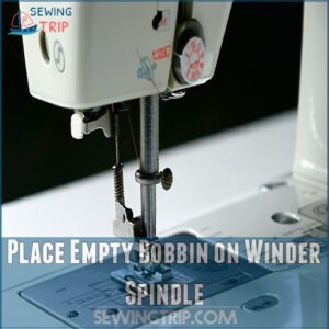 Place Empty Bobbin on Winder Spindle