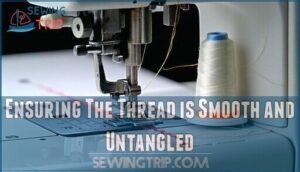ensuring the thread is smooth and untangled