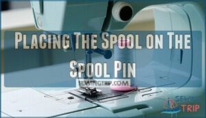 placing the spool on the spool pin