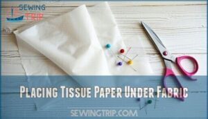 placing tissue paper under fabric placing tissue paper under fabric