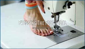 pressing the foot pedal