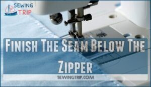 finish the seam below the zipper