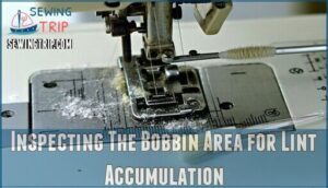 inspecting the bobbin area for lint accumulation