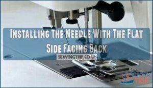 installing the needle with the flat side facing back