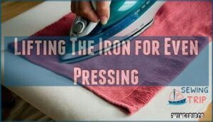 lifting the iron for even pressing