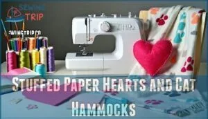 stuffed paper hearts and cat hammocks