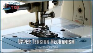 upper tension mechanism