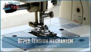 upper tension mechanism