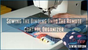 sewing the binding onto the remote control organizer