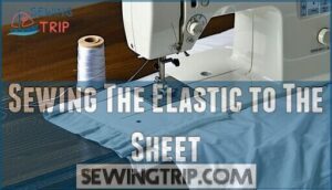 sewing the elastic to the sheet