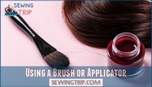 using a brush or applicator