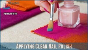 applying clear nail polish