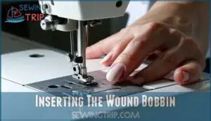 inserting the wound bobbin