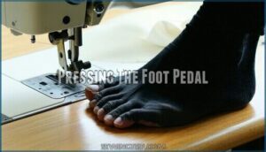 pressing the foot pedal