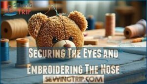 securing the eyes and embroidering the nose