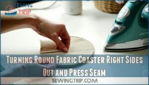 turning round fabric coaster right sides out and press seam