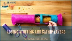 adding stuffing and catnip layers