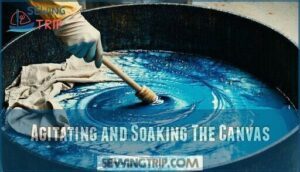 agitating and soaking the canvas