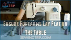 ensure forearms lay flat on the table