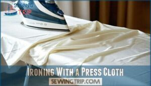 ironing with a press cloth