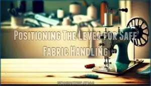 positioning the lever for safe fabric handling
