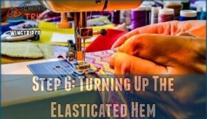 step 6: turning up the elasticated hem