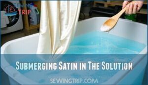 submerging satin in the solution