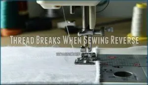 thread breaks when sewing reverse