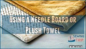 using a needle board or plush towel